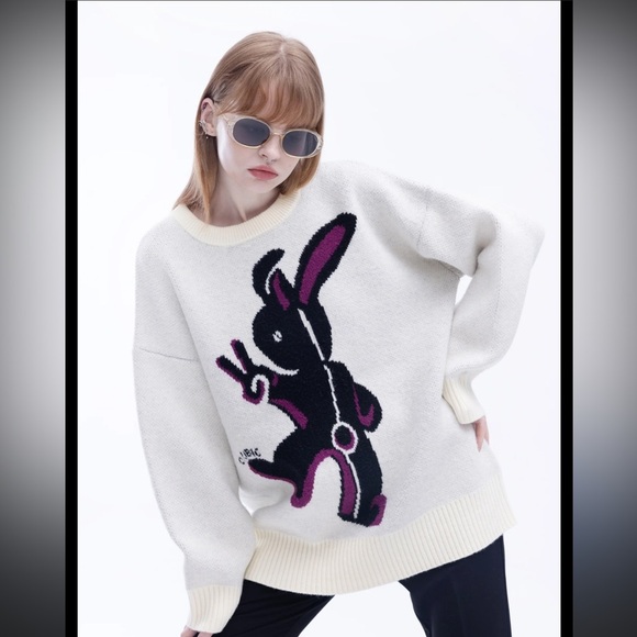 Cubic Cream Sweater with Black and Pink Graphic - Picture 1 of 7